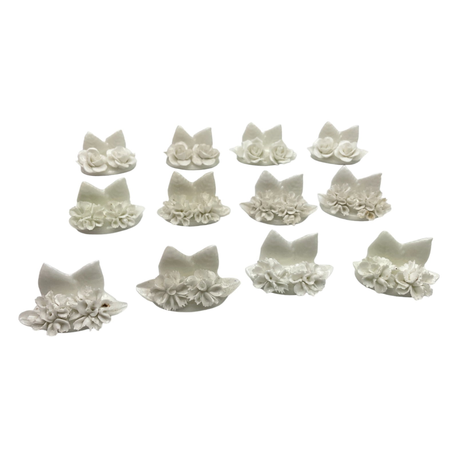 Lot of 12 Coalport Bone China Place Card Holders: Lot of 12 Coalport (England) Bone China floral arrangement Place Card Holders. Approx. 1 Inch tall x 1.75 wide x 1 deep, 10 oz together.