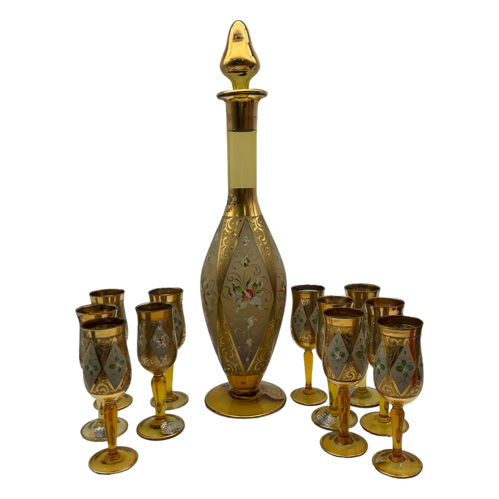 Lot of 12 Bischoff Cherry Wine Handmade Decanter and 11 Sherry Glasses: Bischoff Cherry Wine Hand blown and Hand Painted with 18k Gold Decanter and 11 Sherry Glasses made in Italy. Approx. (decanter) 16 inches tall x 4 across,1.6 lbs. (sherry glass) 5 tall x 1.75 across, 