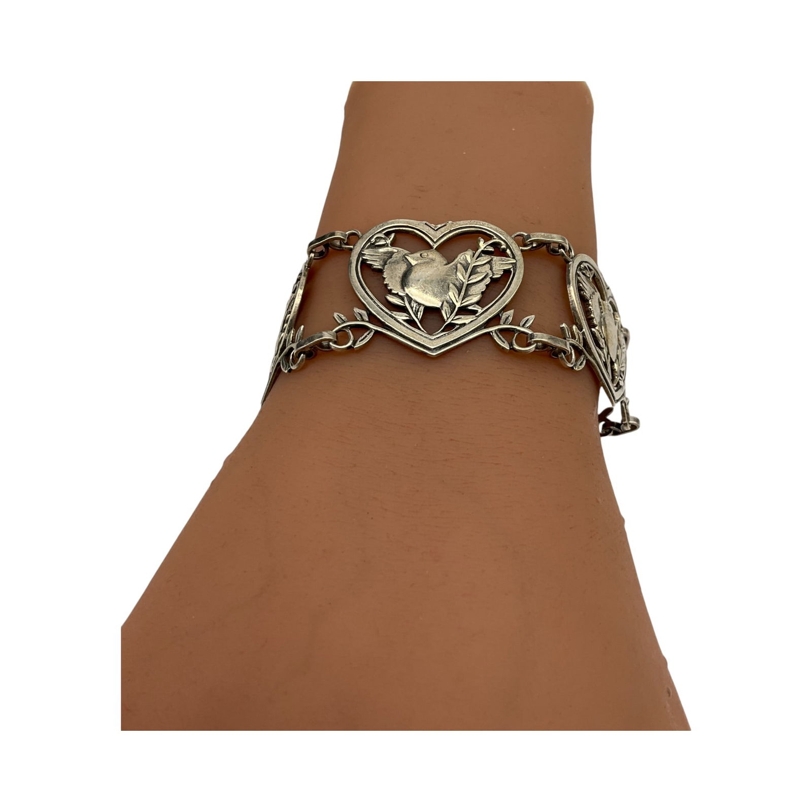 Coro Craft Sterling Silver Love Doves Bracelet: Coro Sterling Silver Love Doves in Hearts Bracelet. Approx. 2.25 inches across x 1 deep, 32 grams.