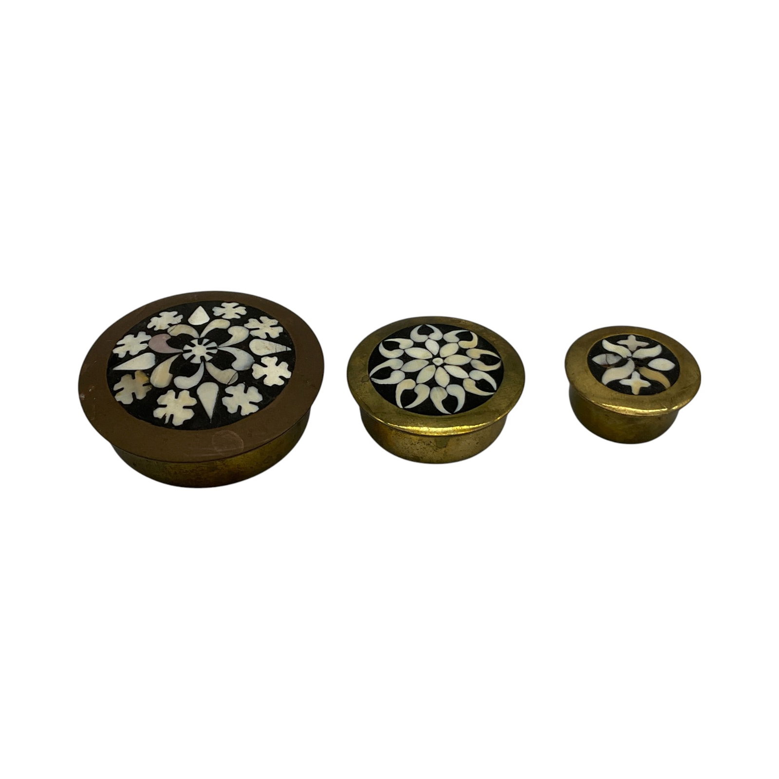 Lot of 3 Brass Pill Boxes: Lot of 3 Brass Pill Boxes descending in size with bone inlay designs on lids. Approx. 0.5 inches tall x 1,1.5, 2 across, 2.1 oz.