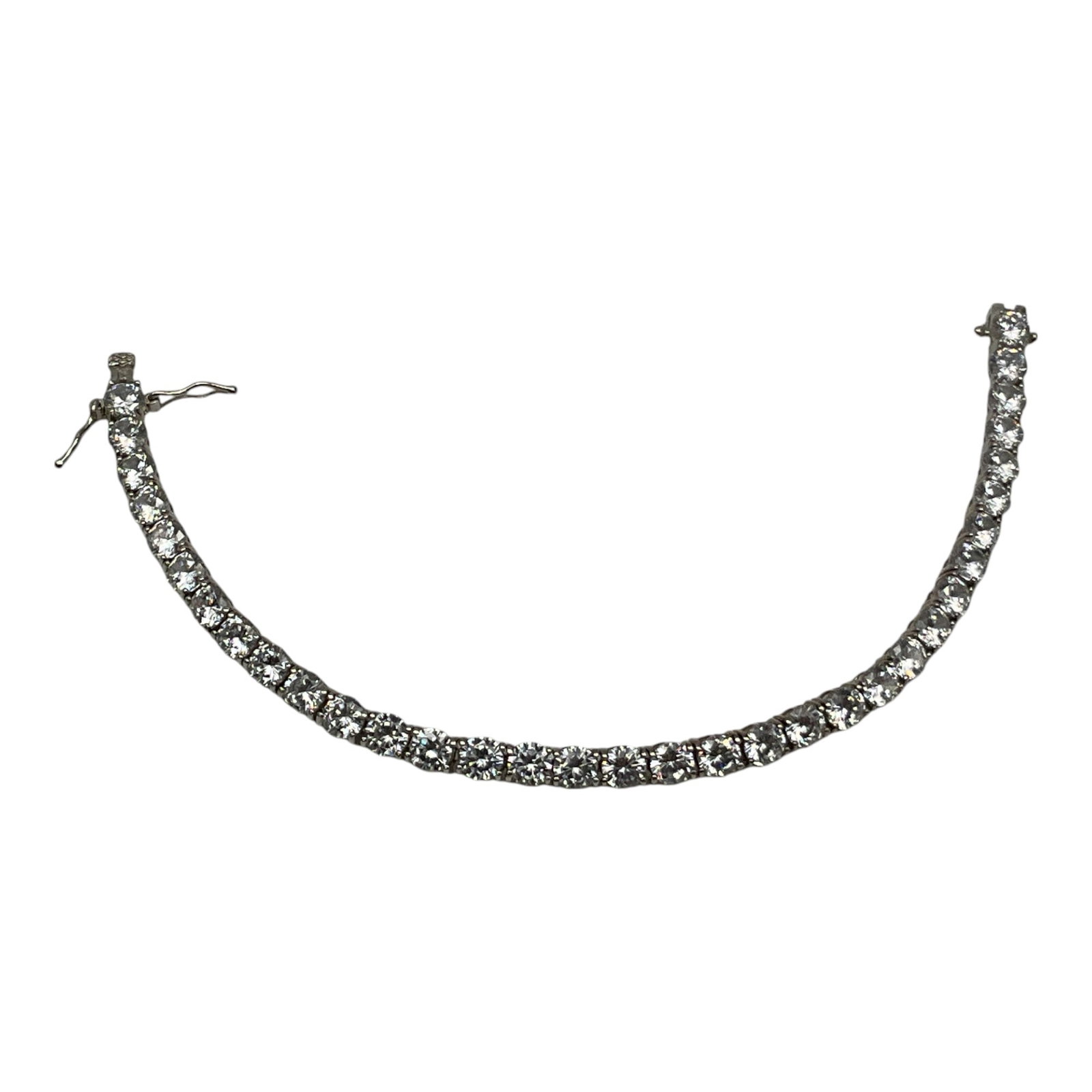 925 FAS Marked Tennis Bracelet: 925 FAS Marked Tennis Bracelet. Approx. 7.5 inches end to end.