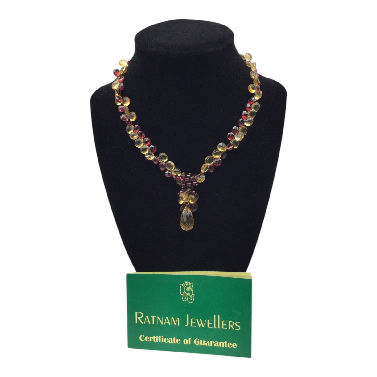 925 Floating Gemstone Necklace W/Certificate from Ratnam Jewellers: Elegant Floating 925 barrel closure Gemstone Necklace with Garnets and Yellow Topaz natural stones, with Certificate from Ratnam Jewellers. Approx. 15.25 inches long, with 1.5 inch drop center.