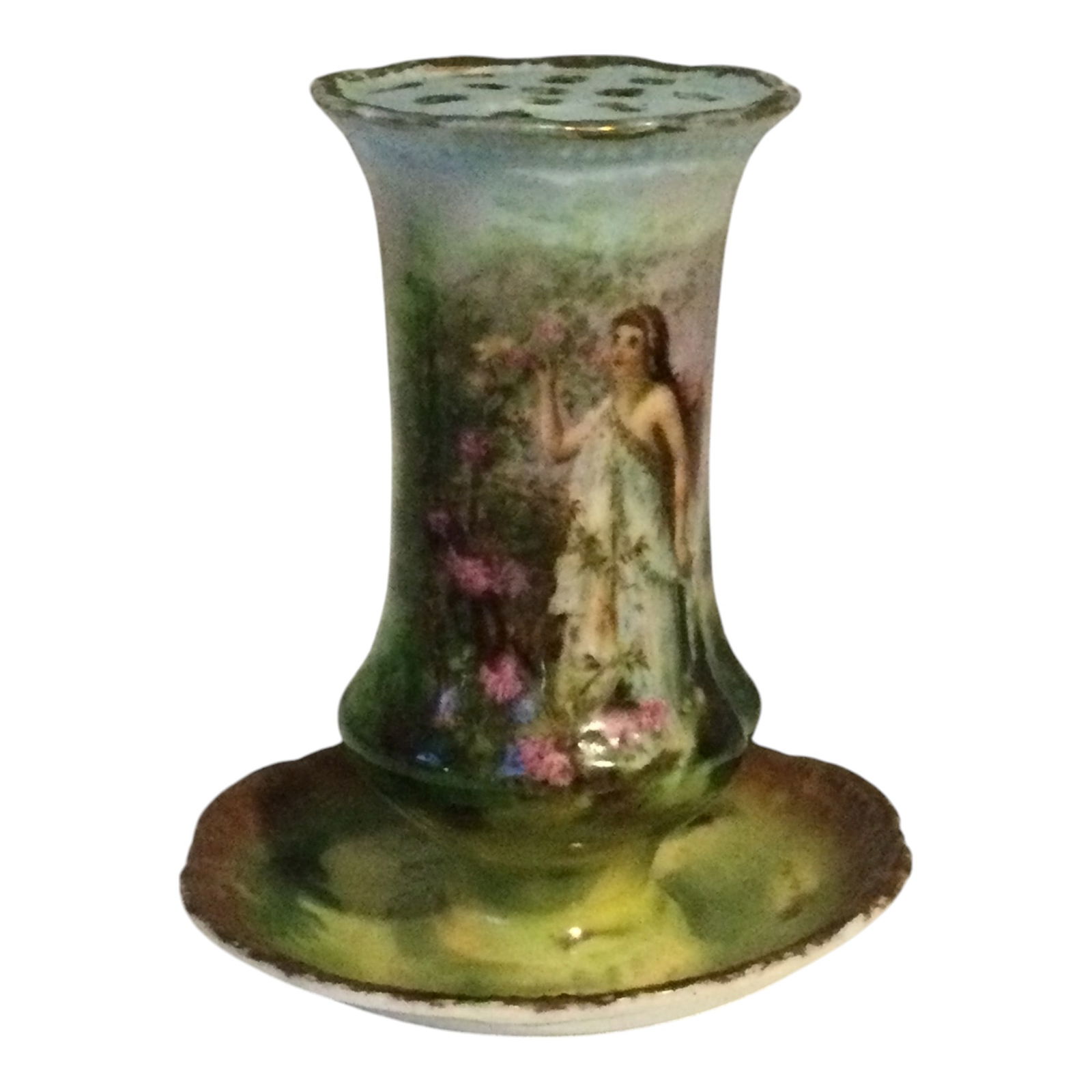 Vintage Austrian Porcelain Hat Pin Holder: Vintage Austrian Hat Pin Holder Depicting a Nymph at a Rose Garden, Stamped Austria on bottom, holds up to 13 pins. Approx. 4.5 inches tall x 4.25 at widest. Condition very good with minimal signs of