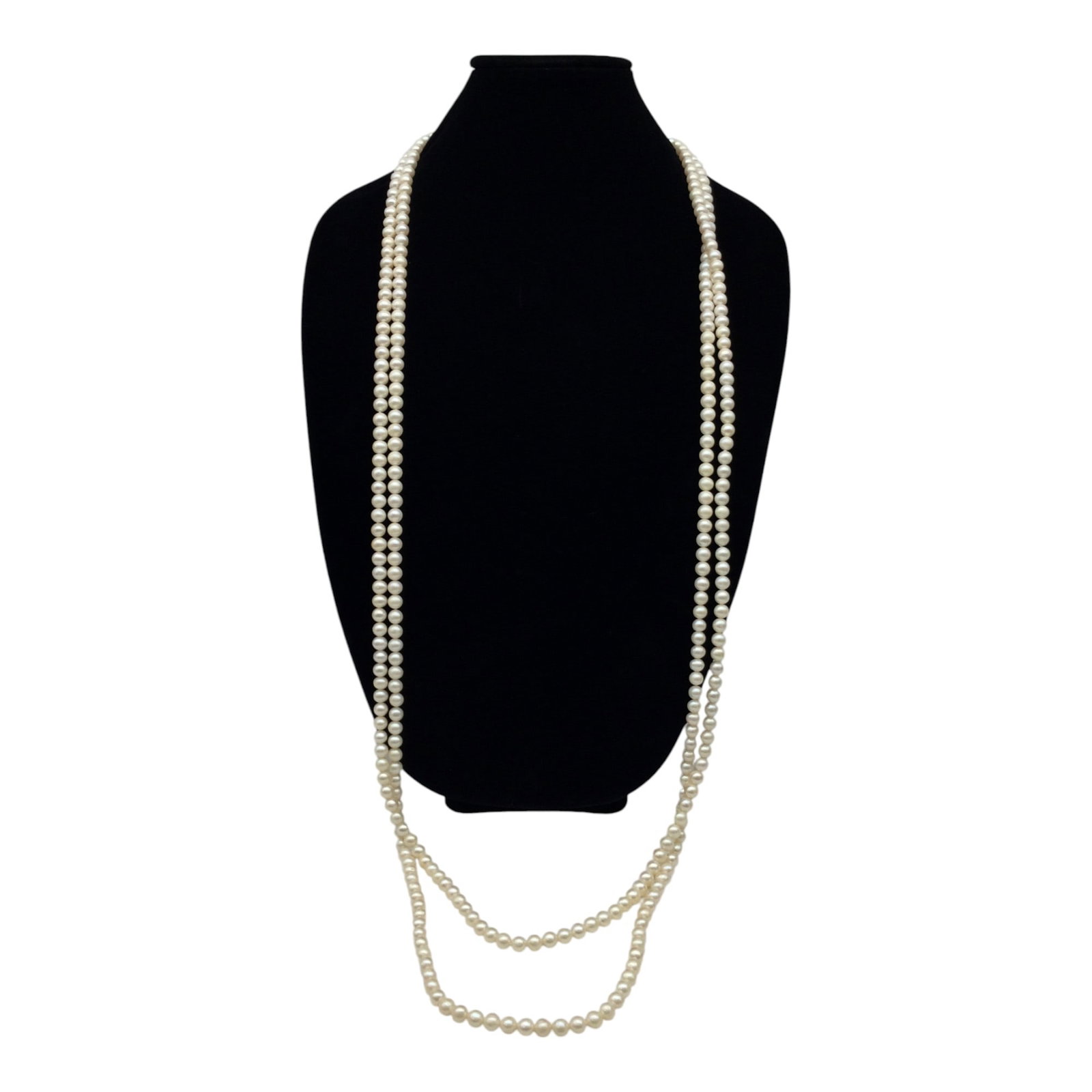 Macy's 100 Inch Cultured Pearls Endless Necklace: 100 Inch Cultured Pearl endless Necklace, with Macy's instruction Booklet on how to wear, 7-8 mm Pearls. Condition: Excellent no signs of damage or wear.