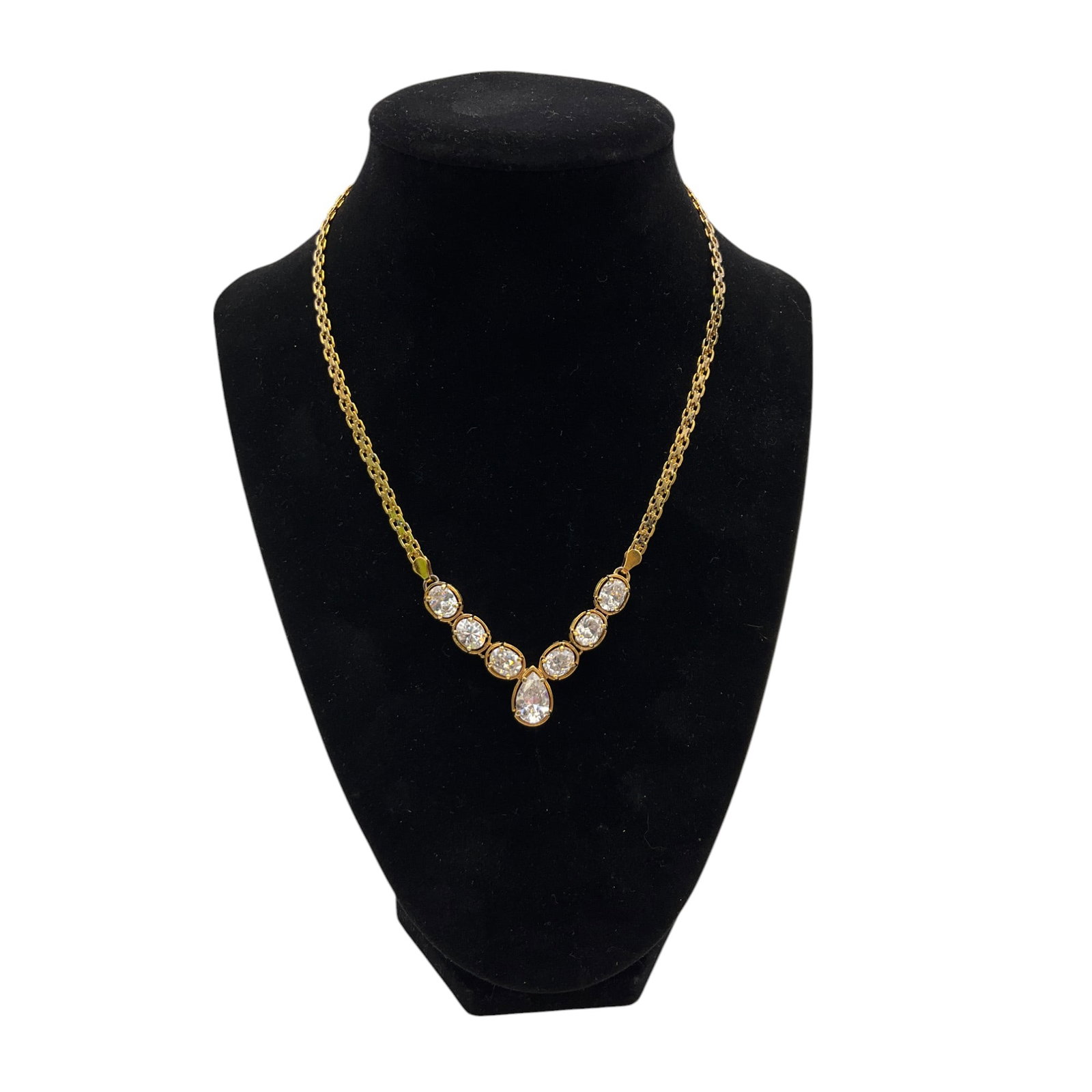 Italy 925 Gold Plated CZ Necklace: Made in Italy Gold Over 925r Raindrop Necklace with 6 oval CZ's and 1 teardrop shaped. Approx. 16 inches end to end.