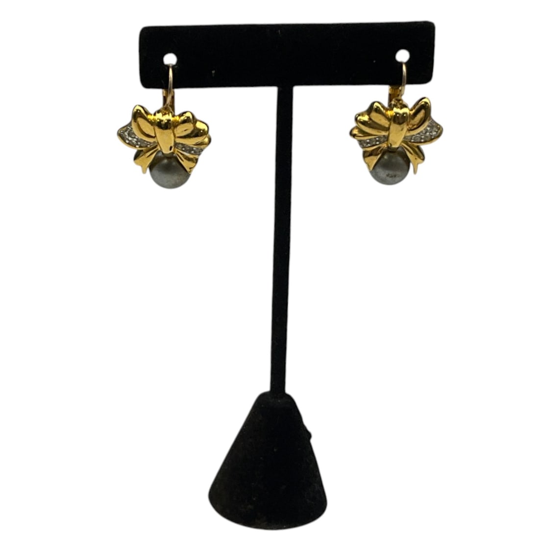 KJL Bow Earrings: KJL faux pearl and Rhinestone bow Earrings. Approx. 1.25 inches tall x 1 wide.