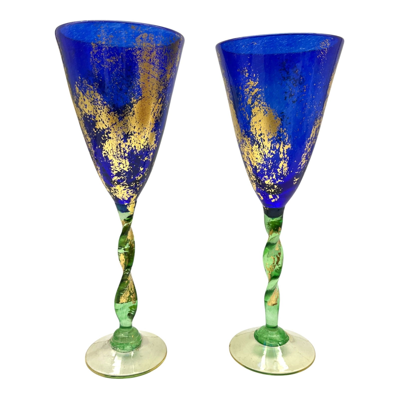 Pair of Helena Gibson Champagne Glassware: Pair of Helena Gibson signed blue, gold and green champagne glasses. Approx. 9.5 inches tall x 3-3/8 wide, and combined weight of 1 lbs.