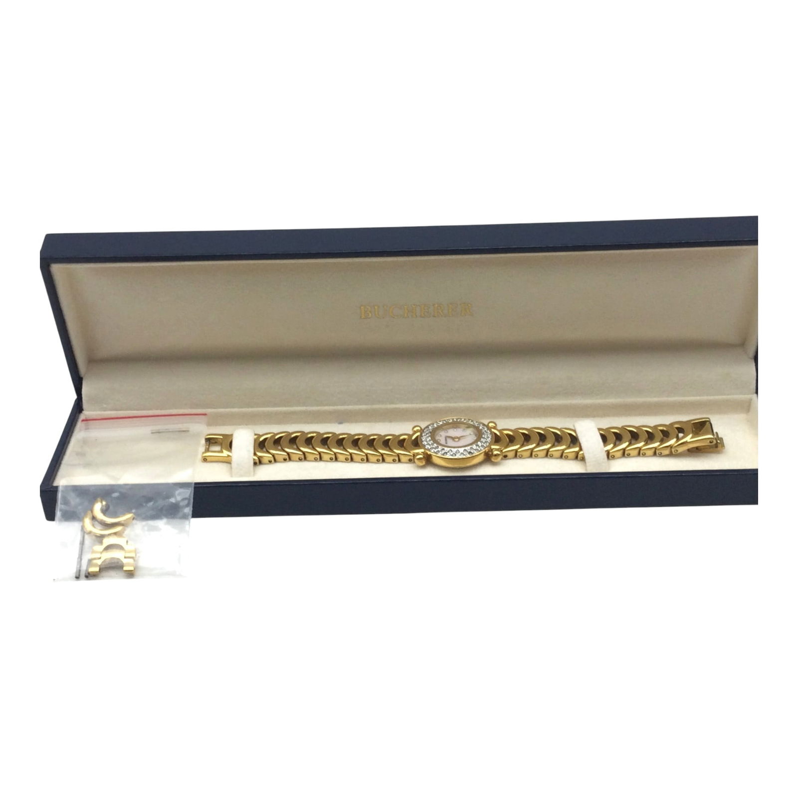 Vintage Bucherer Crystal Bezel Women Watch: Vintage Bucherer Crystal Bezel Women Watch, extra links included, in original box. Approx. 6 inches end to end, 7/8 wide.1.8 oz.