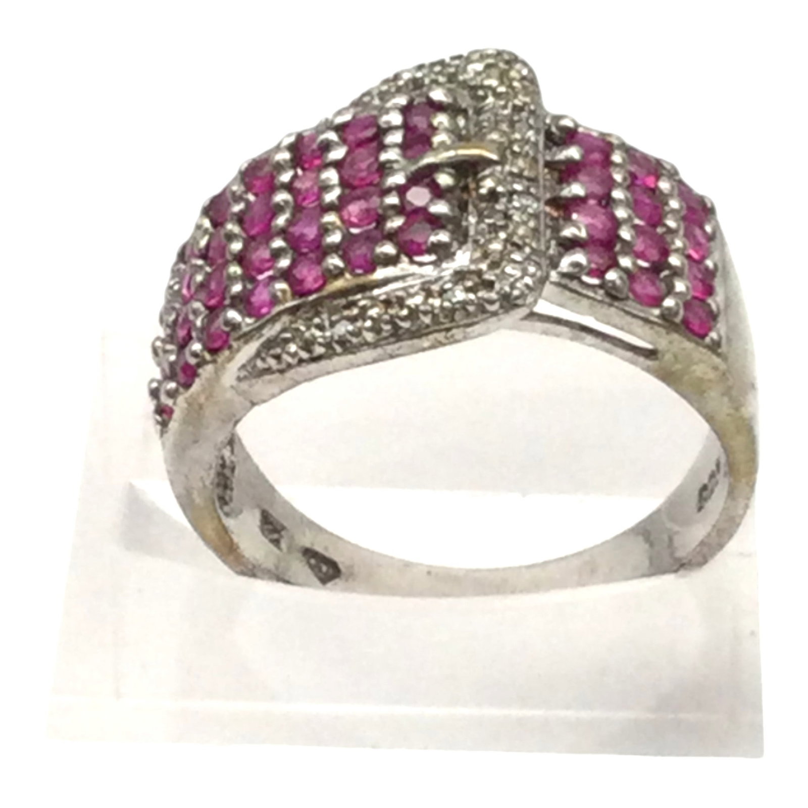 925 Zales Jewelers Pink Garnets Buckle Ring Sz. 8: 925 Zales Jewelers Pink Garnets Buckle Ring Sz. 8. Approx. 6 g.