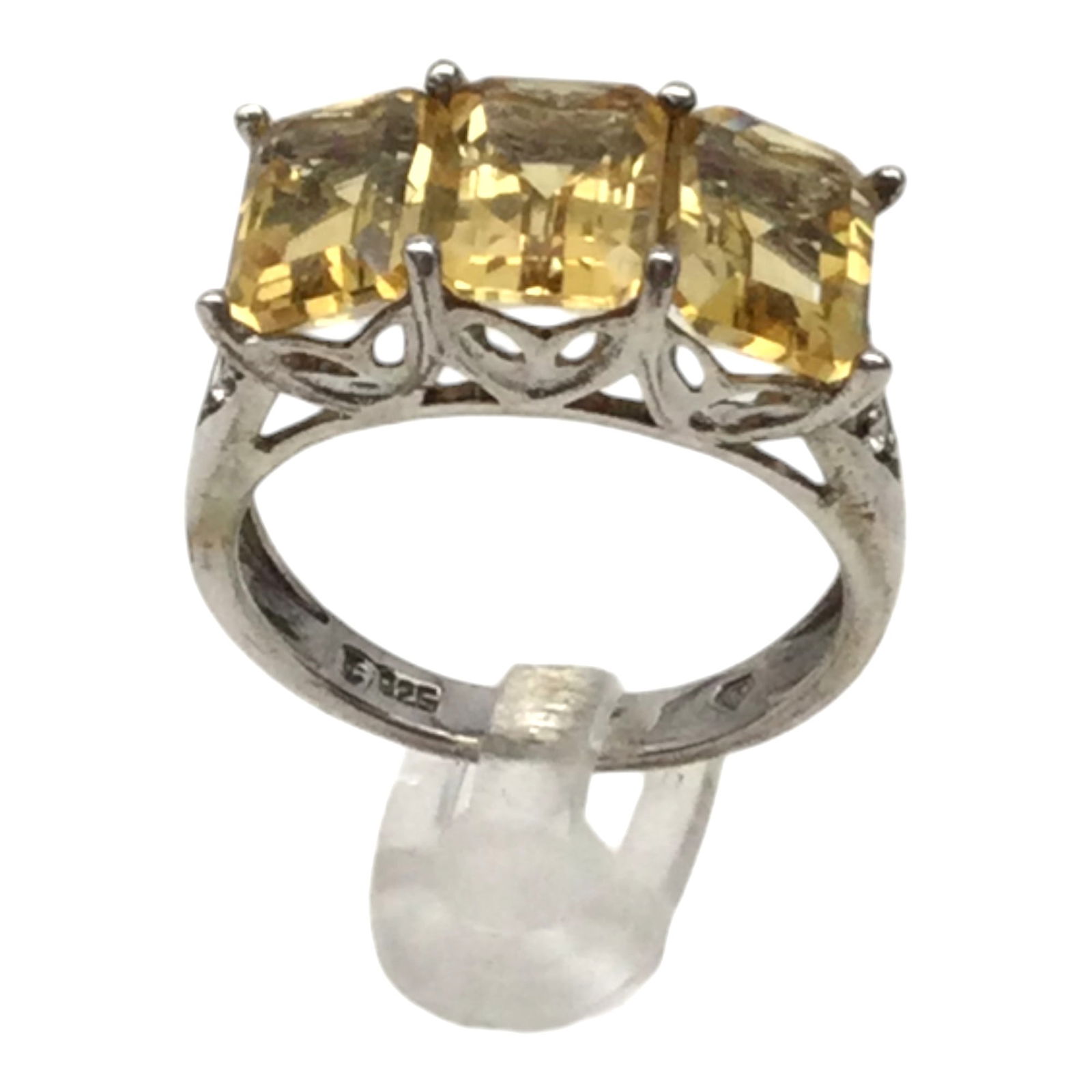 925 Citrine and CZ Accent Ring Sz. 7: 925 Citrine Ring Accented with Cz's size 7. Signed J over C and a Diamond shaped cartouche. Approx. 5/16 inch tall x 0.75 wide, 0.2 oz.