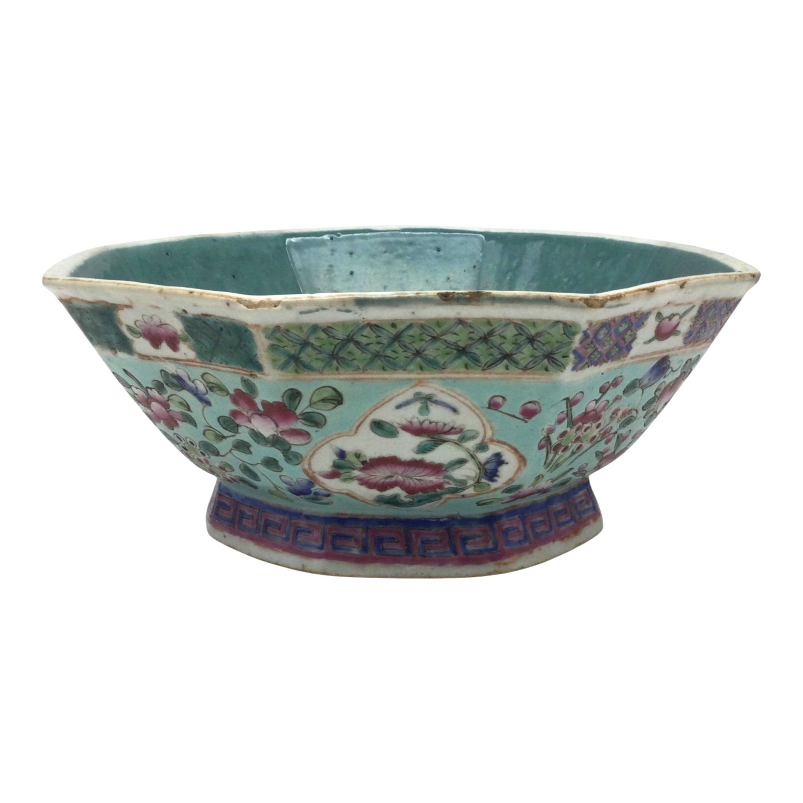 Chinese Famille Rose Octagon Bowl: Chinese Famille Rose Octagon Bowl hand painted multi colored and patterned floral decorated. Approx. 4 inches tall x 10 across, 4.4 lbs.