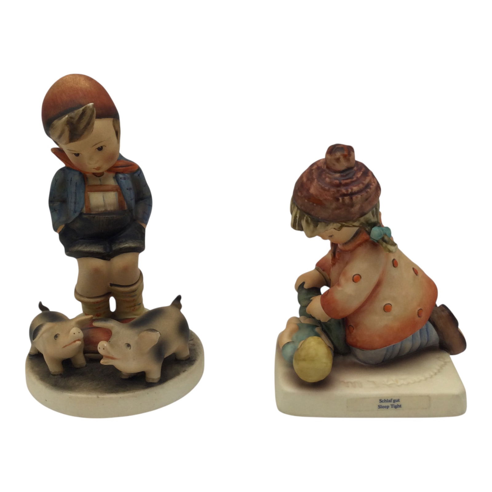 Pair Goebel Hummel Figurines: Pair Goebel Hummel Figurines. 'Farm boy' #66, trademark 1950-1955. "Sleep Tight' #424, trademark 1979-1990. Approx. 6 inches tall x 3 wide x 3 deep, 14 oz. together.