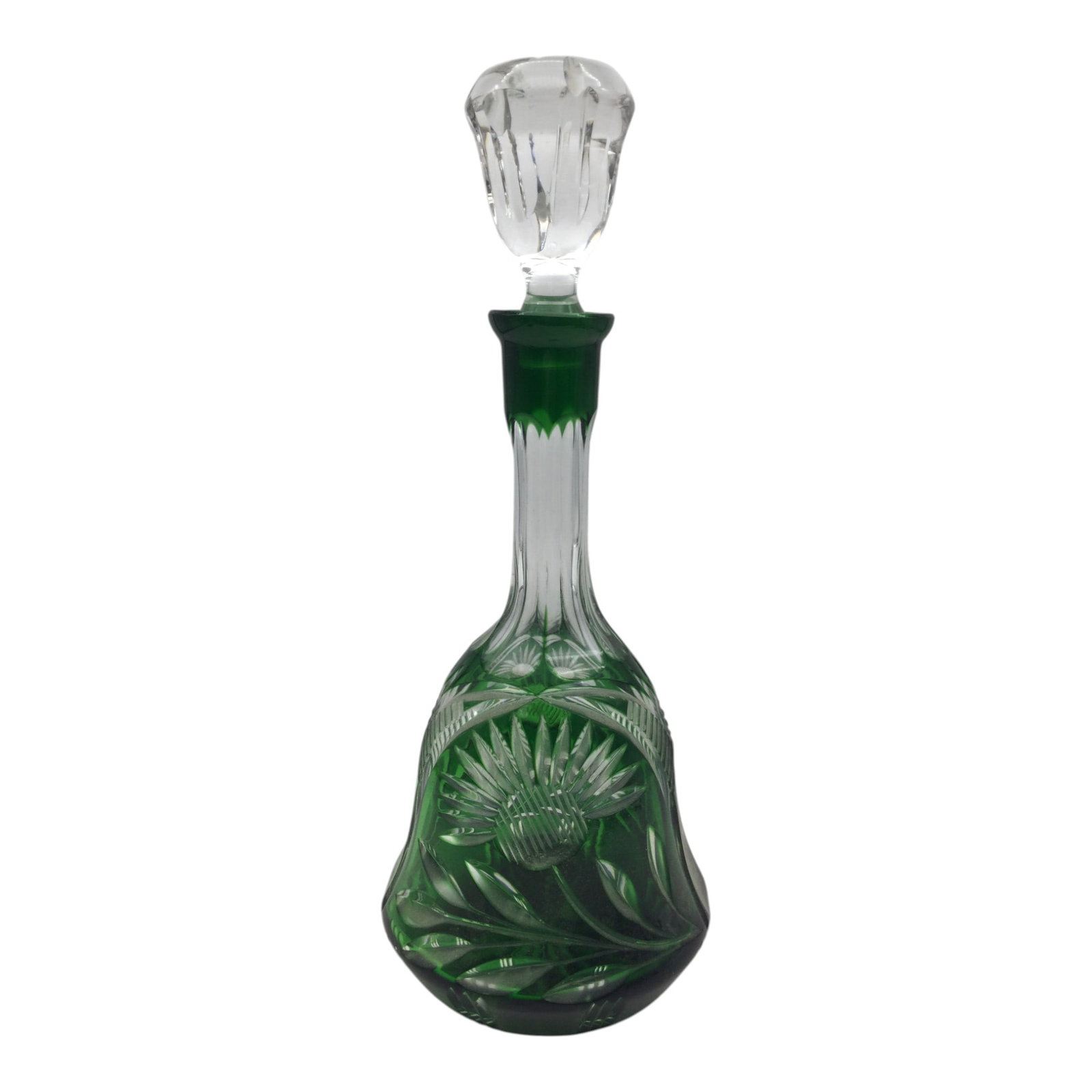 Cut to Clear Glass Decanter: Green Cut to Clear Glass Decanter. with Stopper. Approx. 15 inches tall x 5.5 across. 4.2 lbs.