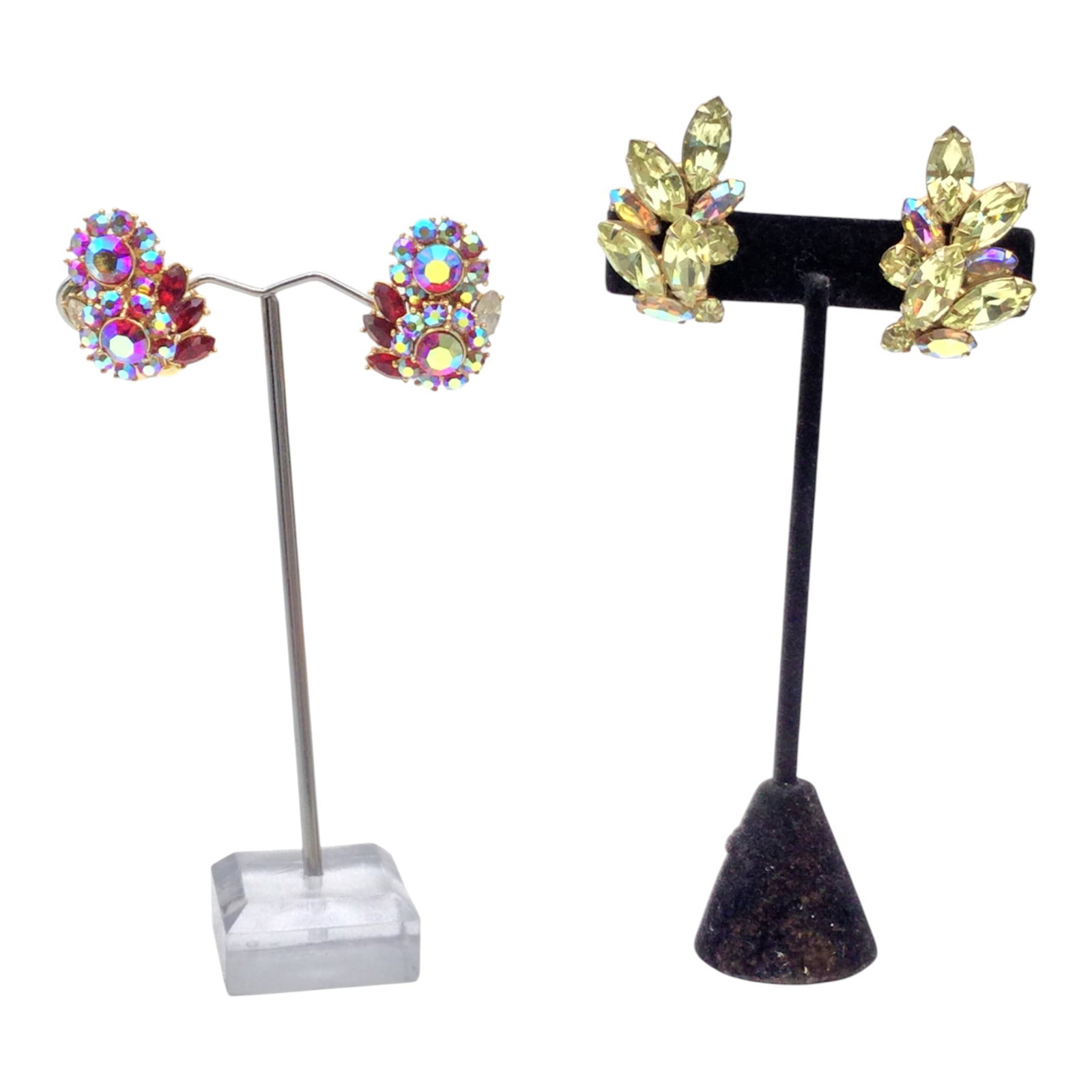 2 Pair of Clip-on Earrings Trifari and Weiss: 2 Pair of Clip-on Earrings. Trifari red iridescent clip-on earrings. Weiss yellow and iridescent clip on earrings. Approx. 1.5 inches tall x 1 wide.