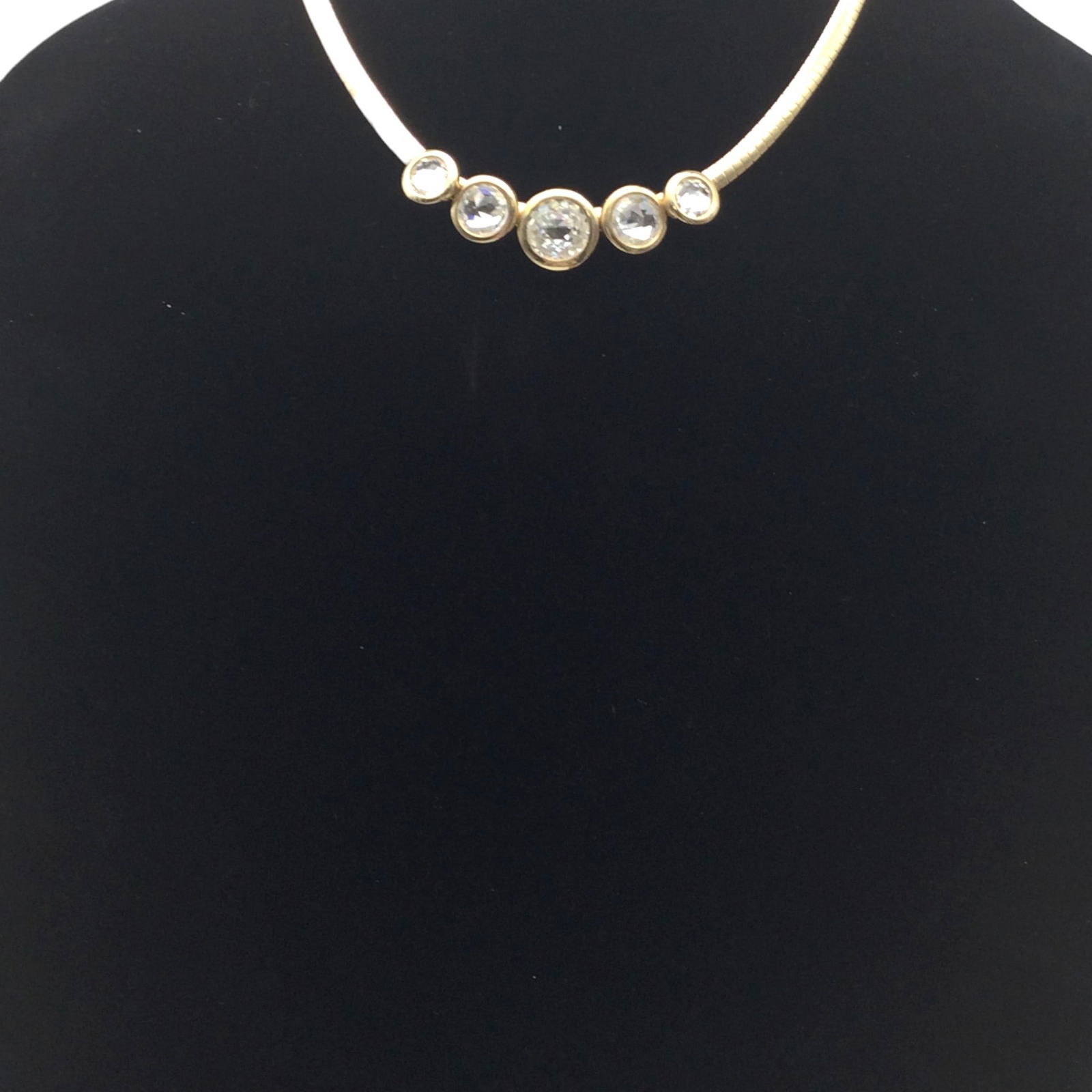 Swarovski Necklace with Crystal Sliders: Swarovski gold Necklace with 5 sliding crystal pendants. approx. 17 inches end to end x 0.5 wide.