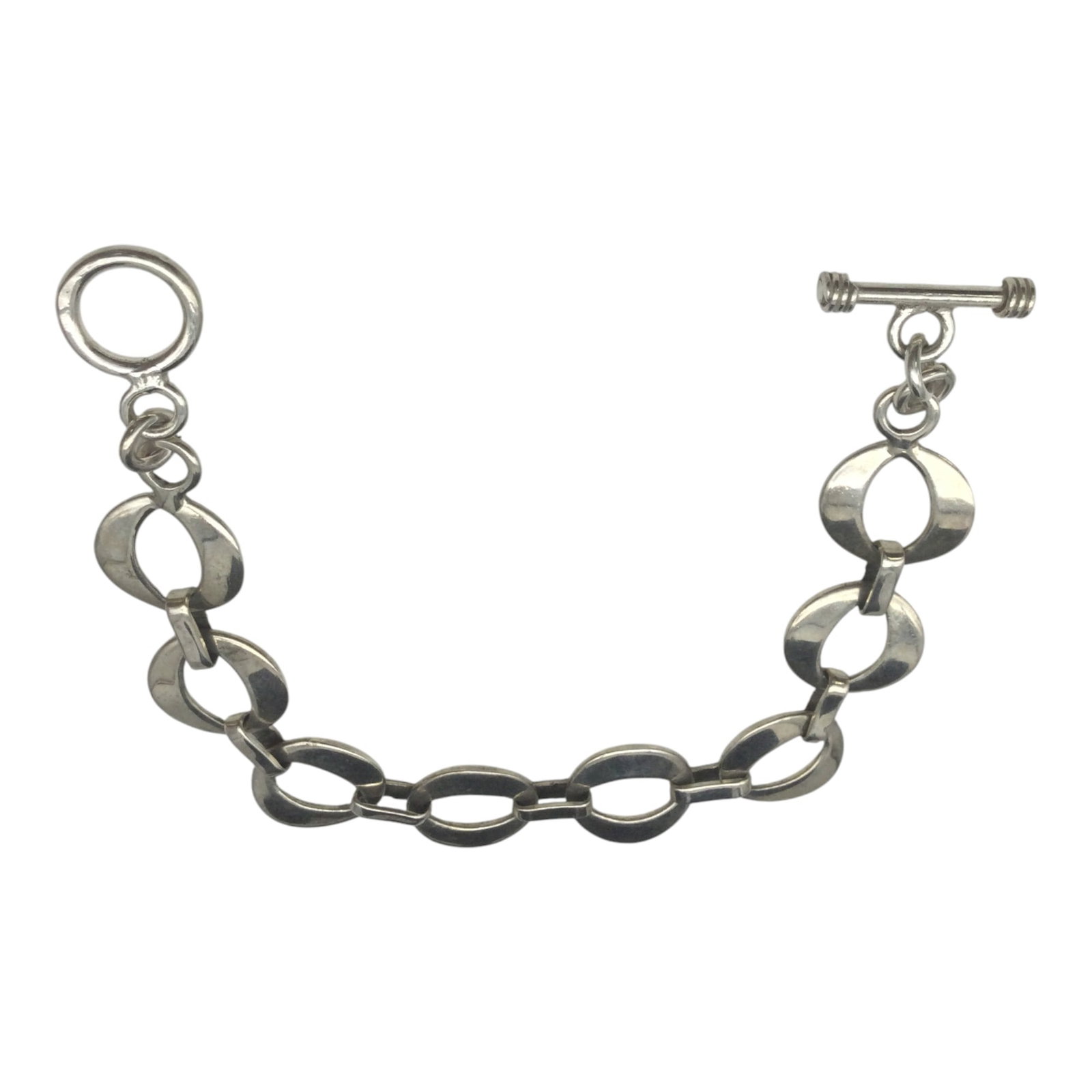 Stamped 925 Sterling Silver Bracelet: Stamped 925 Sterling Silver Bracelet. Approx. 7.25 inches end to end x 5/8 wide.