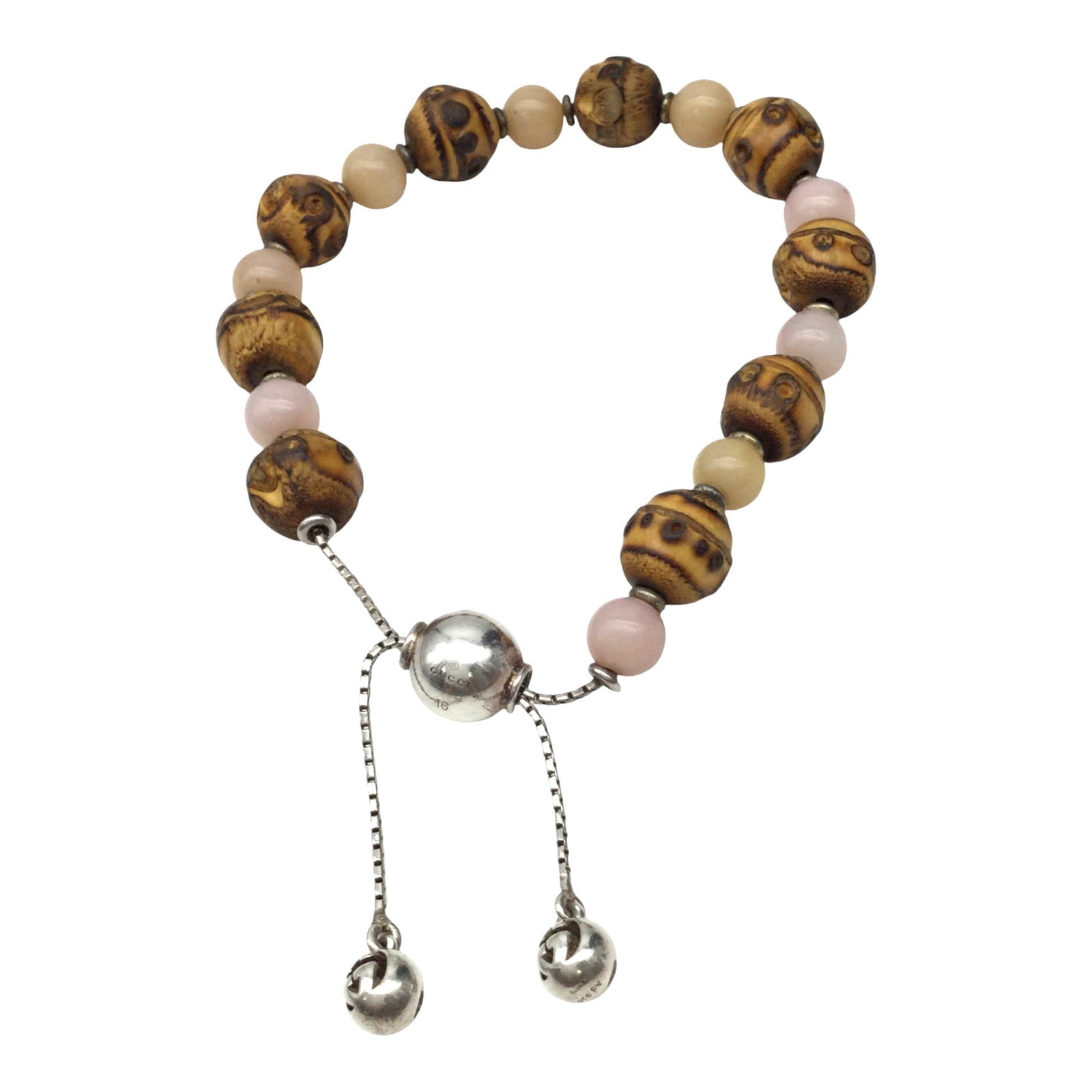 Gucci Beaded Bracelet: Gucci sterling silver, rose quartz, brown stone and bamboo Beaded Bracelet with pull string. Approx. up to 3 inches across, bamboo beads 3/8 wide.