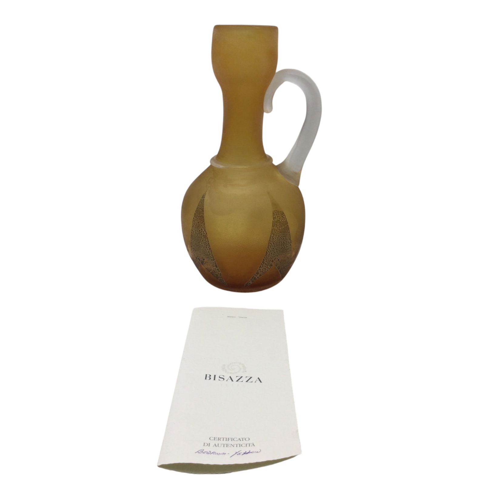Murano Seguso Bisazza Vetro Scavo Pitcher: Vintage Murano Seguso Bisazza Vetro Scavo Pitchers featured with arrow markings and rough textured goldish tone and clear glass. Approx. 11.5 inches tall x 6 wide x 6 deep,