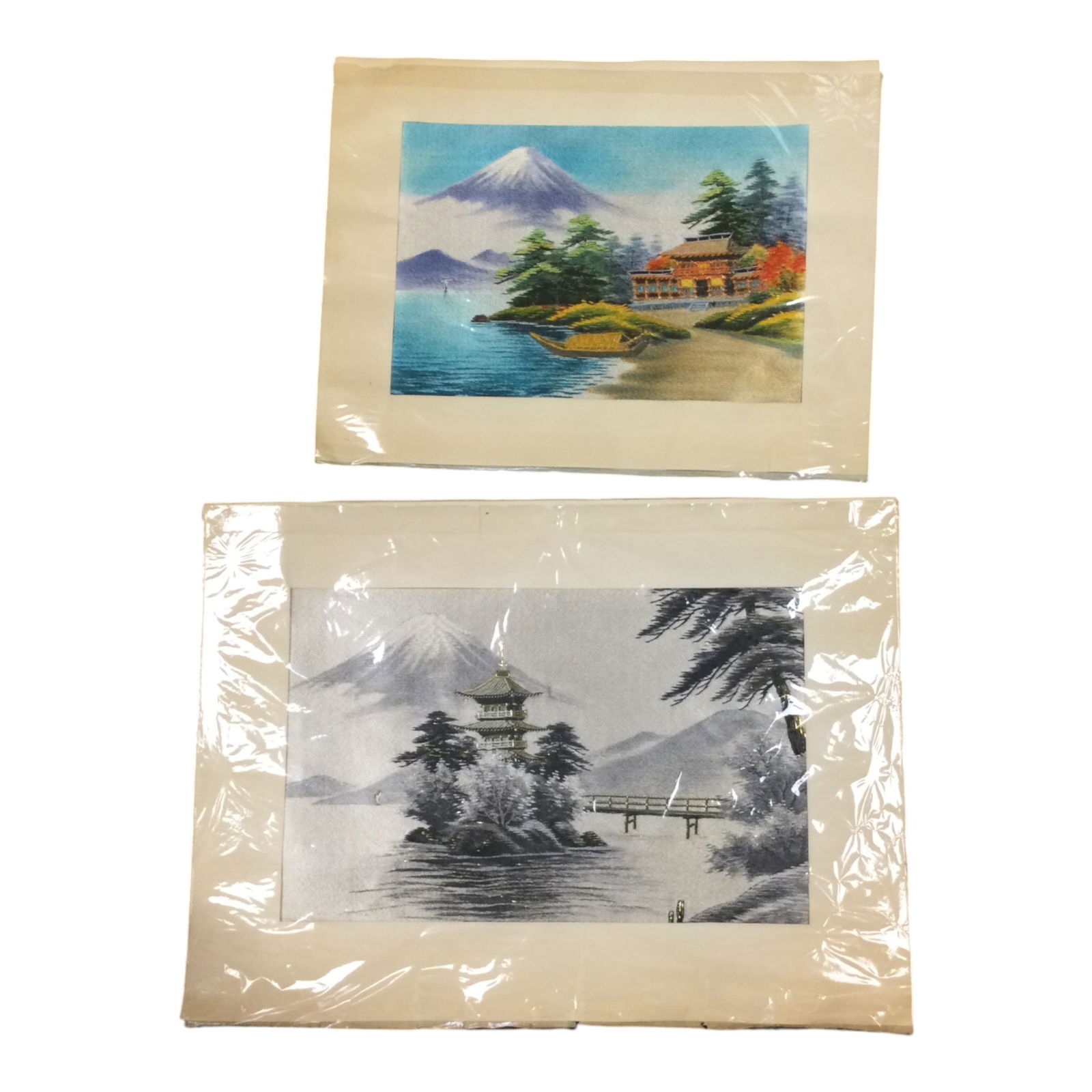 Pair Japanese Silk Embroidery Landscapes: Pair Japanese Silk Embroidery Scenescapes. Smaller piece is depicting a colorful landscape with Mount Fuji, approx. 12 inches tall x 15.75 wide. the larger embroidery depicts Mount Fuji from a