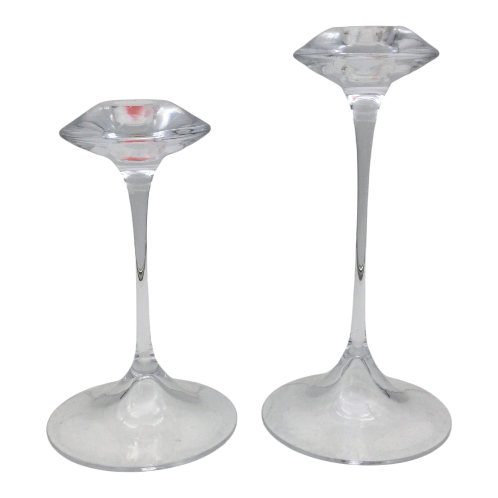 Pair Kosta Boda Candlestick Holders: Pair Kosta Boda, Fanfare Candlestick Holders. Approx. 7.25, 9 inches tall x 4.25 across, 1.9 lbs.