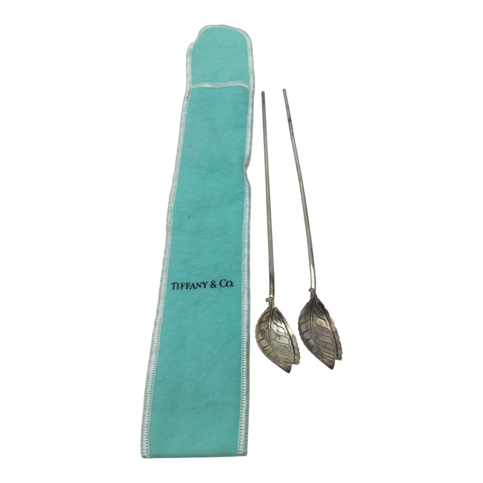 Pair Tiffany and Co. Sterling Silver Tea Cocktail Straw Spoons: Pair Tiffany and Co. Sterling Silver Tea Cocktail Straw Spoons, with leaf shaped spoon. Approx. 8.2.5 inches tall x 1 wide, 0.8 oz.