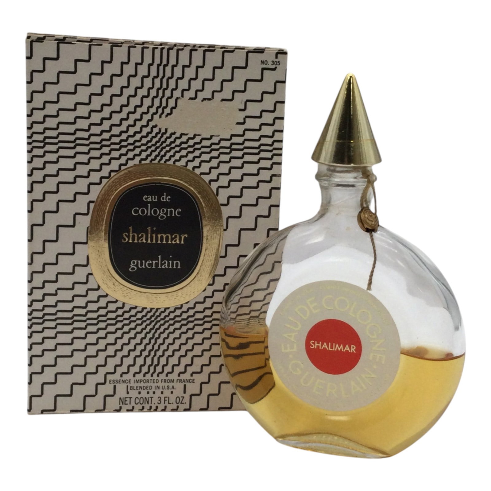 Vintage Shalimar Guerlain Eau de Cologne Bottle: Vintage Shalimar Guerlain Eau de Cologne Bottle 3 Fl. oz. Approx. 5.5 inches tall x 4 wide x 1 deep, 6.1 oz. Approx. 50% full.