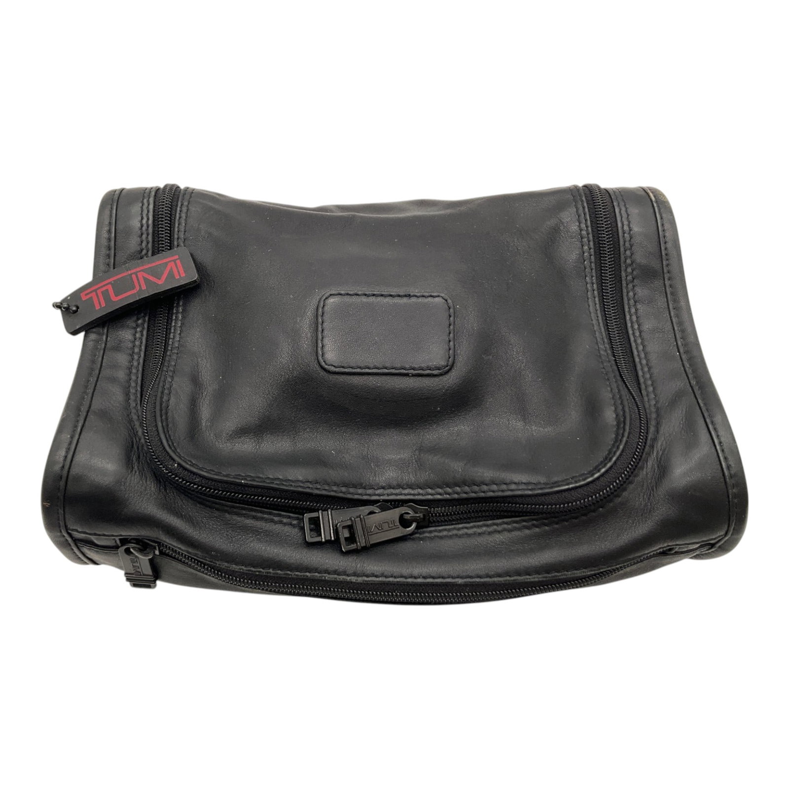 TUMI Leather Toilettree Bag: TUMI Black Leather Toilettree Bag. Approx. 3.5 inches tall x 11 wide x 7 deep, 12 oz.