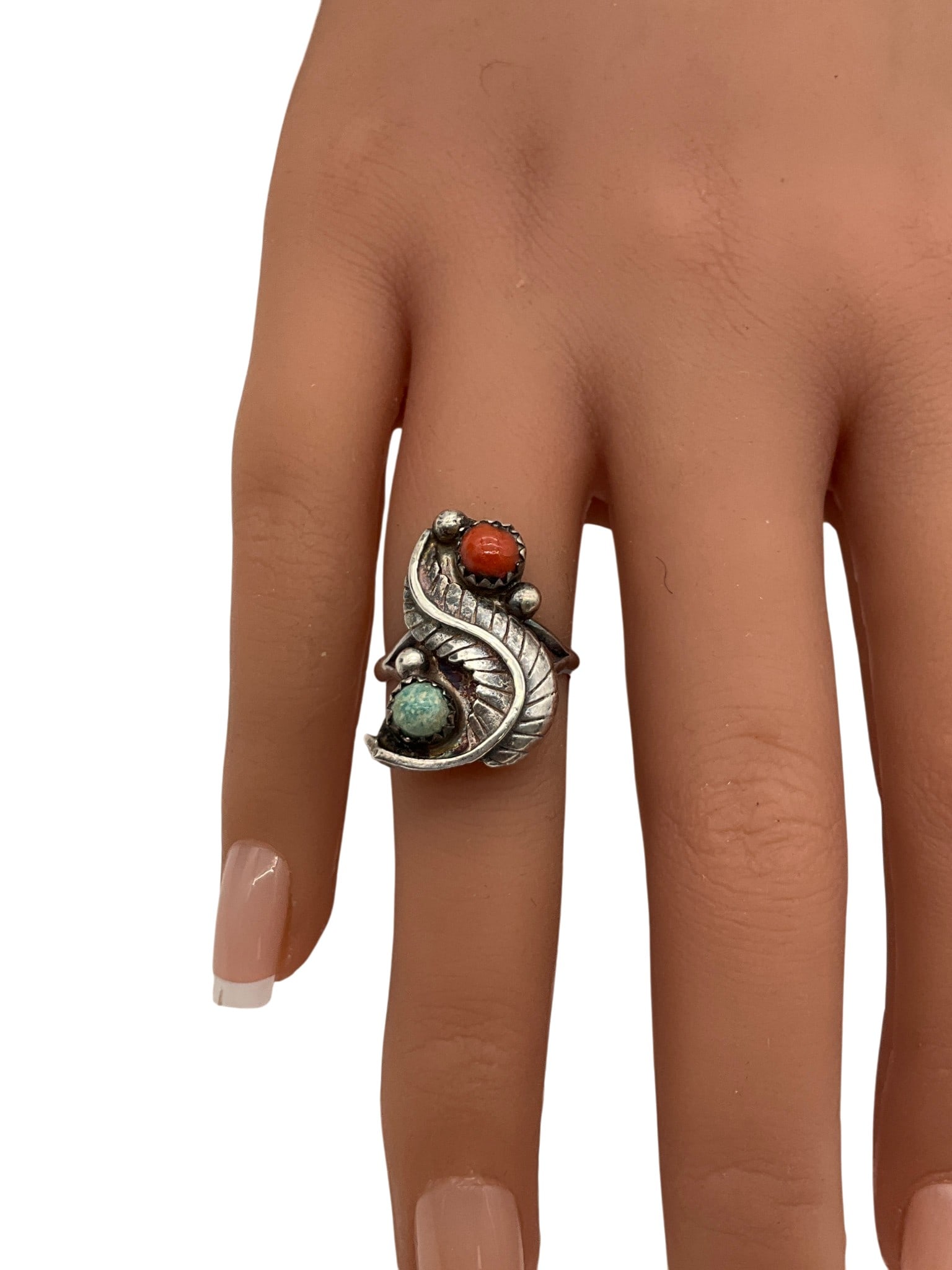 Vintage 900 Silver Southwestern Turquoise/Coral Ring: 900 silver Feather design silver ring with turquoise and coral stone, no Hallmarks, tested as 900 or better sterling. Approx. Ring Size 5.5. 1 inch tall x 0.75 wide x 1 deep.