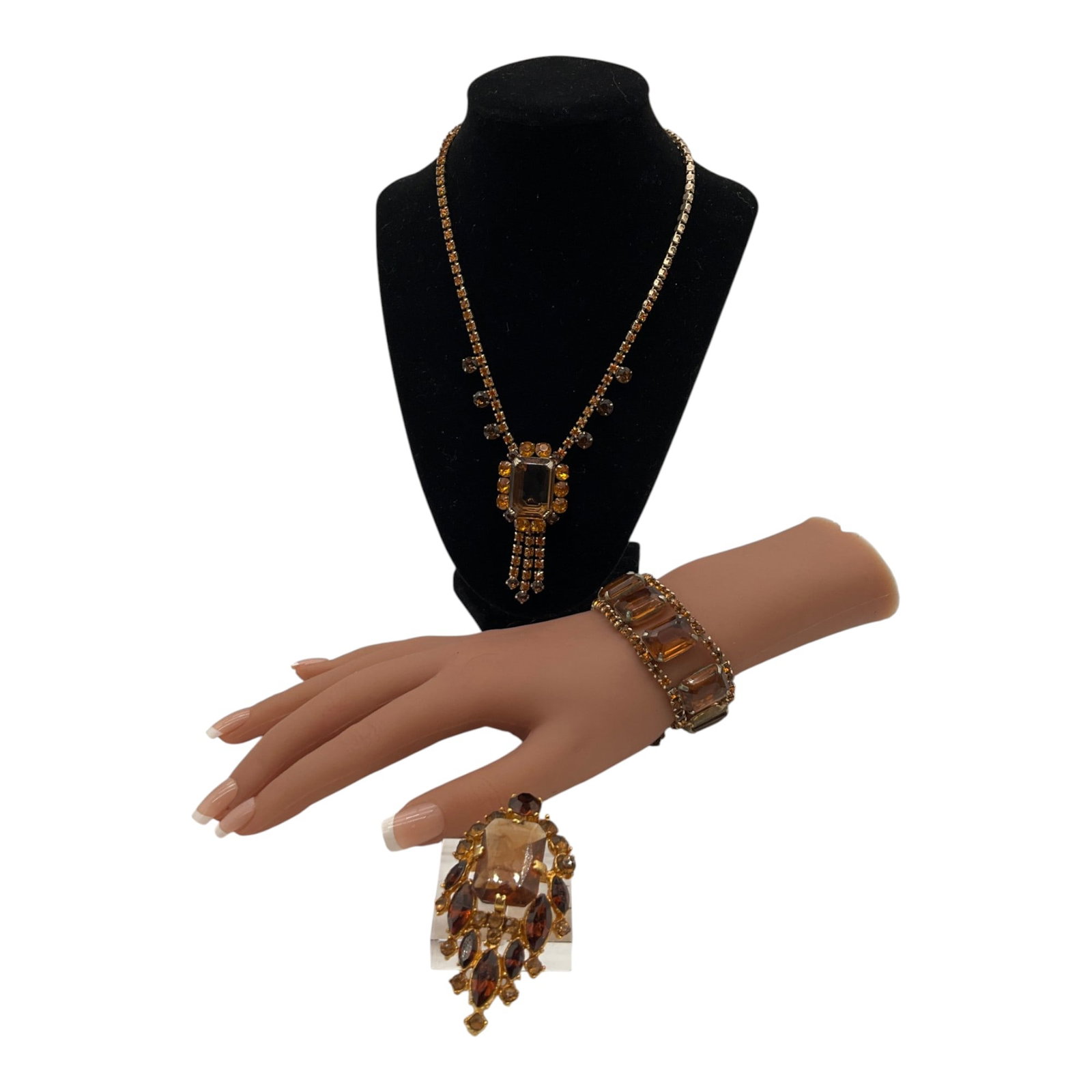 Vintage Amber Rhinestone 3 Piece Set: Vintage Amber Rhinestone Set of bracelet, necklace and brooch. Approx. (bracelet) 7 inches end to end x 1 wide 0.25 deep, (necklace) 17.5 end to end, (pendant) 2.5 tall x 1.25 wide, (brooch) 3 tall x