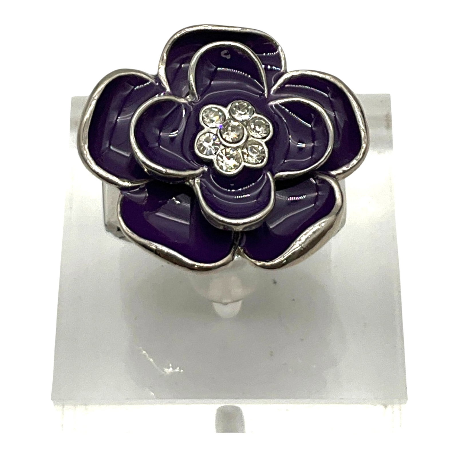 Collezio Sophie Enamel Floral Ring Watch: Collezio Sophie purple enamel Ring Watch. Stainless steel expanding band. Approx. 1.25 inches tall x 1 wide x 1-1/8 deep.