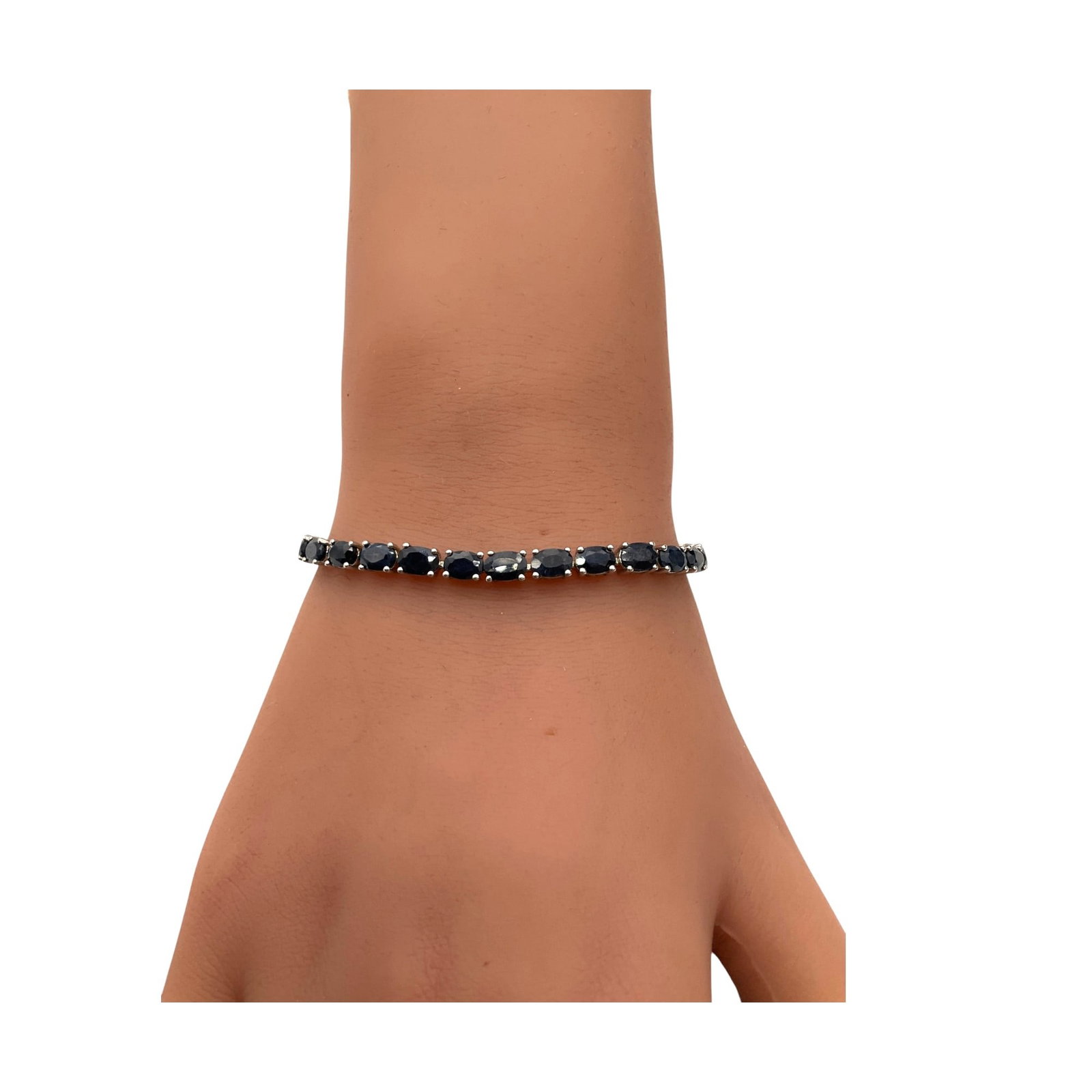 Marked STS 925 Sterling Silver Tennis Bracelet.: Marked STS 925 Sterling Silver Tennis Bracelet with oval shaped blue sapphires. Approx. 6.75 inches end to end.