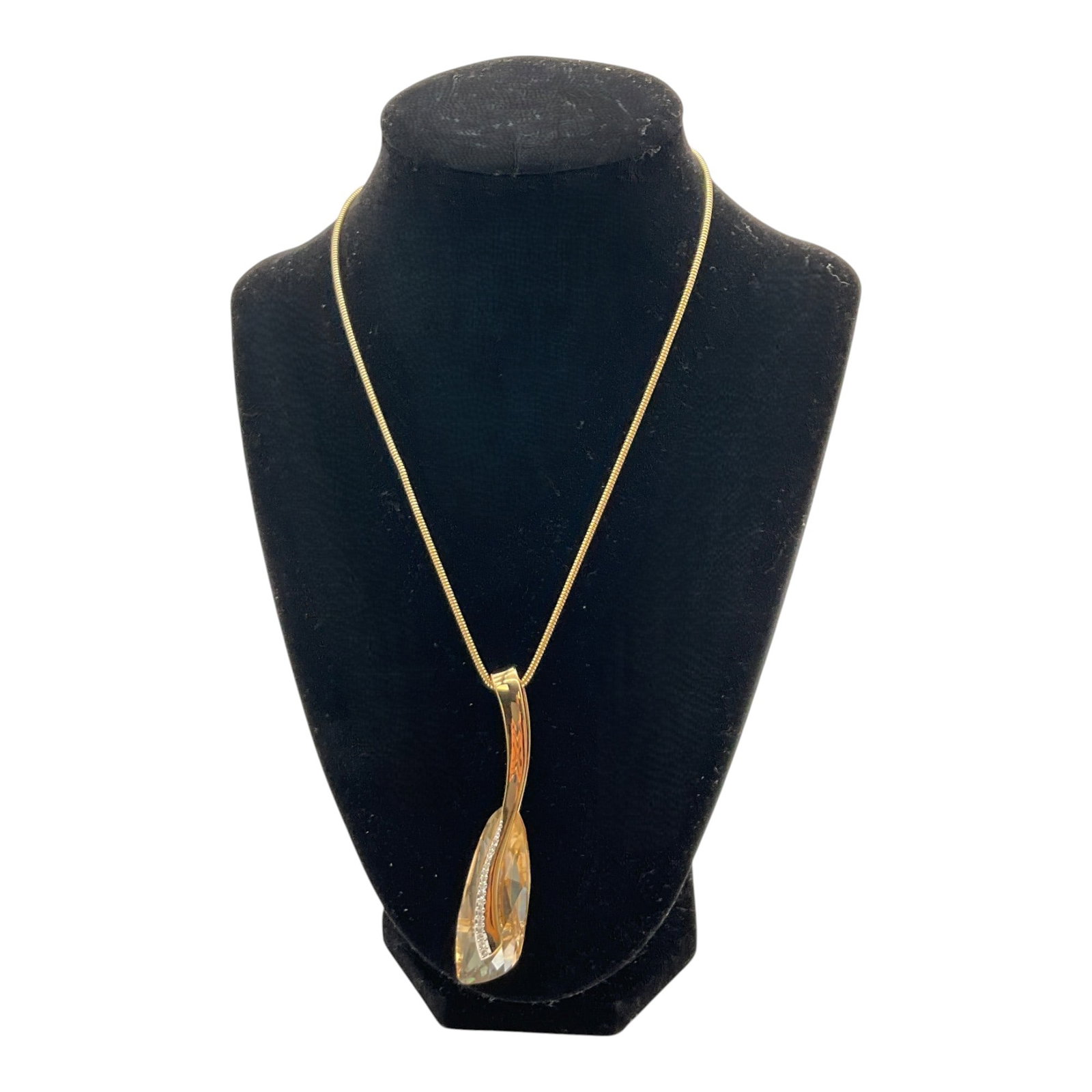 Swarovski Gold Necklace and Large Crystal Pendant: Swarovski Gold Necklace and Large gold and Crystal freeform Pendant. Approx. 18 inches end to end, (pendant) 3 tall x 0.75 across.