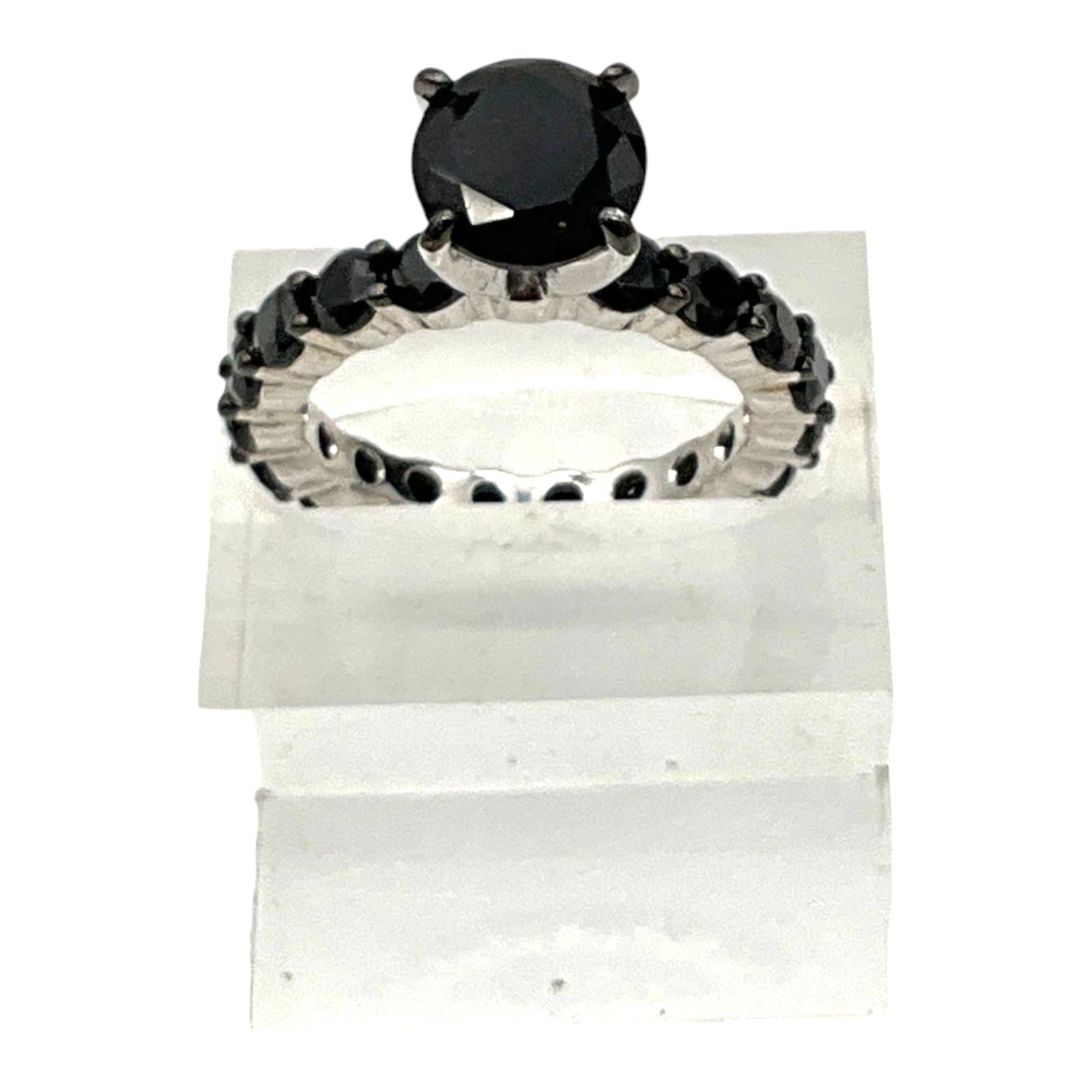 925 FZN Silver and Onyx Ring: Marked FZN CN 925 Silver and Onyx Ring. Approx. size 6, 1.25 inches tall x 1 wide x 0.25 deep.