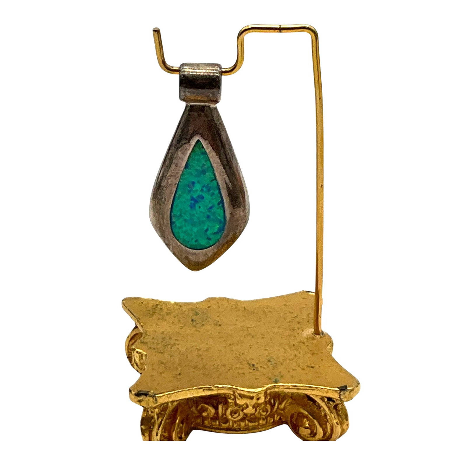 Marked Thailand 925 Opal Pendant: Marked Thailand 925 Silver With Opal Center. Approx. 1.5 inches tall x 1 wide.