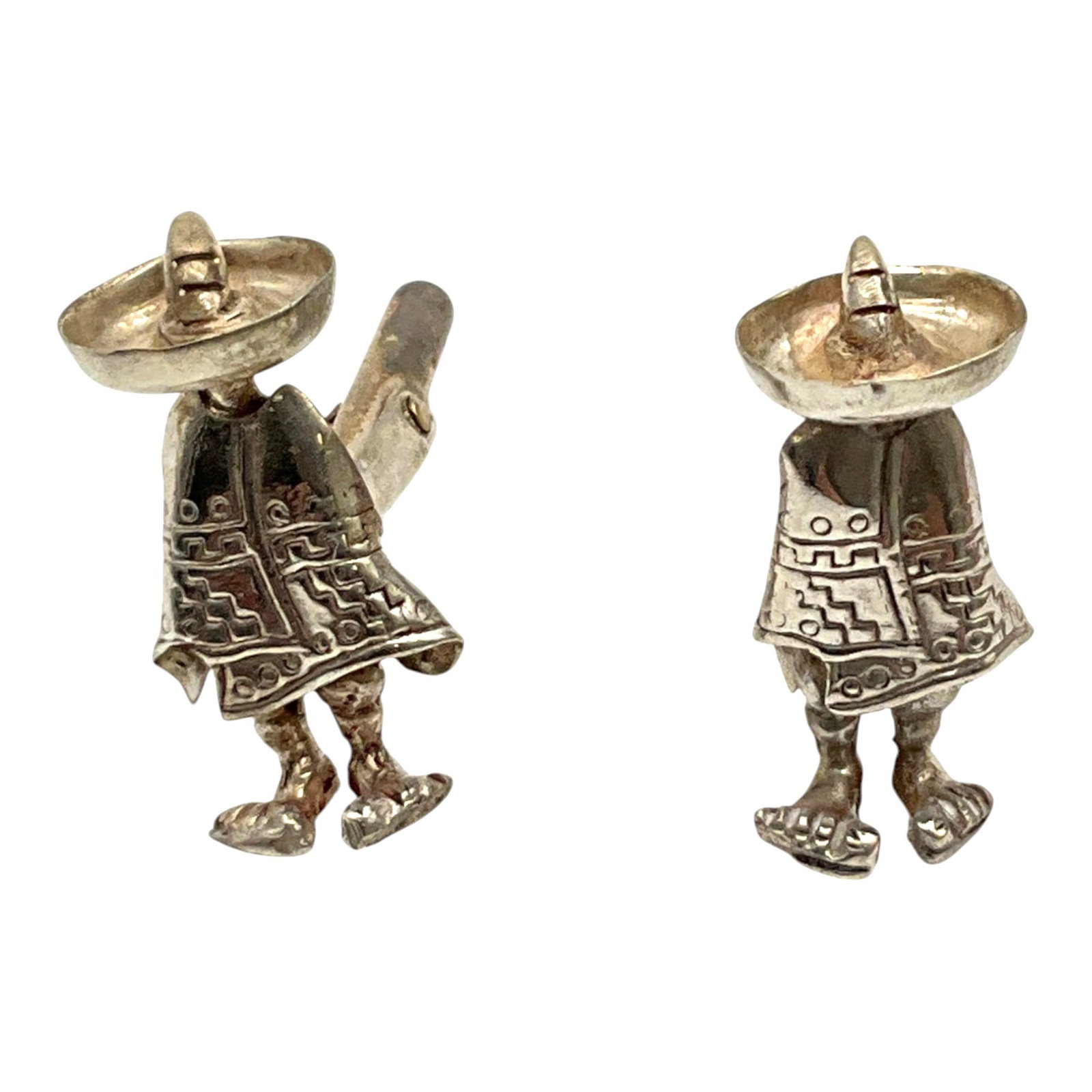 Vintage 925 Taxco Mexico Cufflinks: Marked Mexican 925 Silver Cufflinks designed to look like men wearing sombreros and ponchos. Approx. 1 inch tall x 0.5 wide.