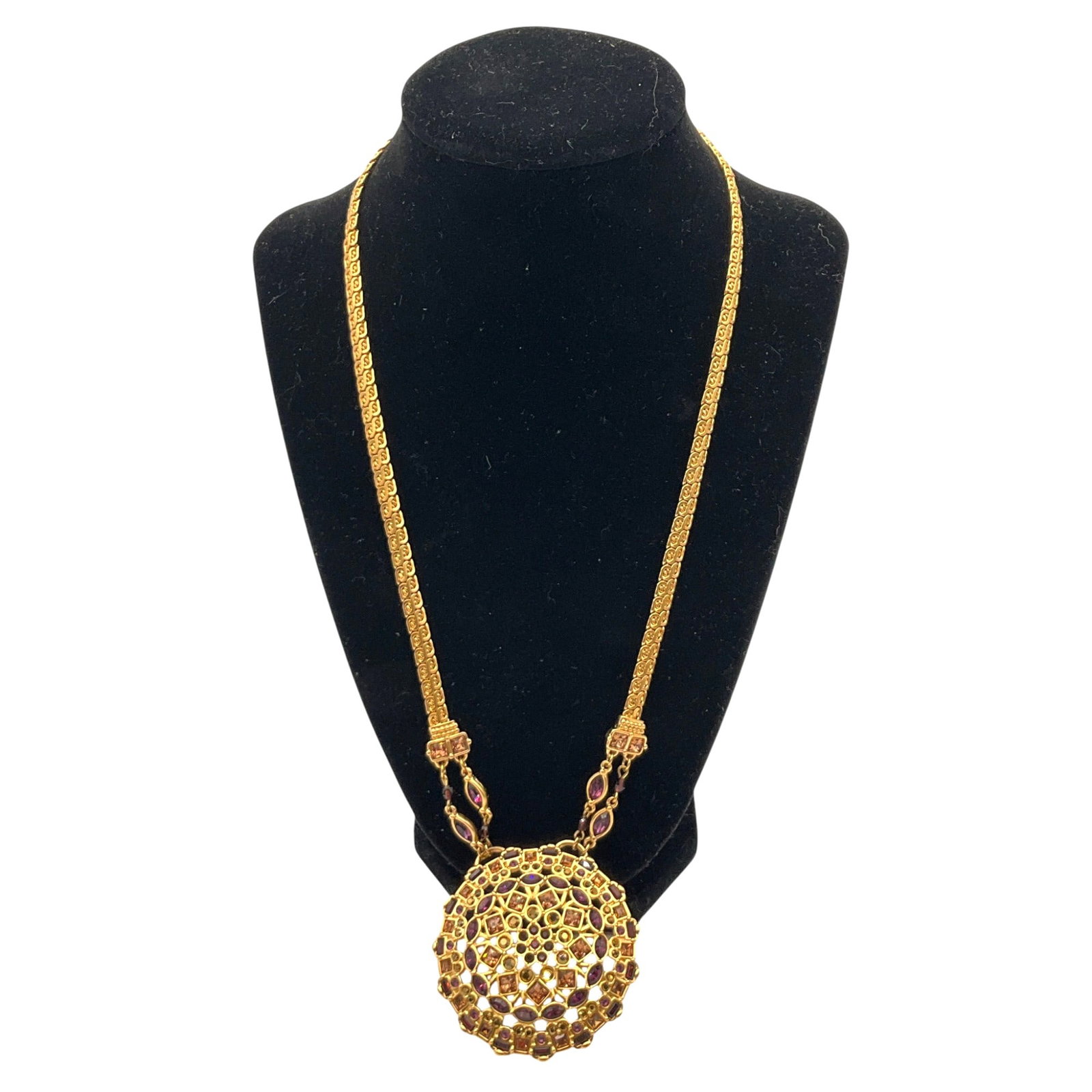 Swarovski Crystal Gold Necklace with Pendant: Swarovski Crystal Gold Necklace and Large Round Pendant with Amber and Amethyst colored Crystals. Approx. 22.5 inches end to end x 2.25 tall.