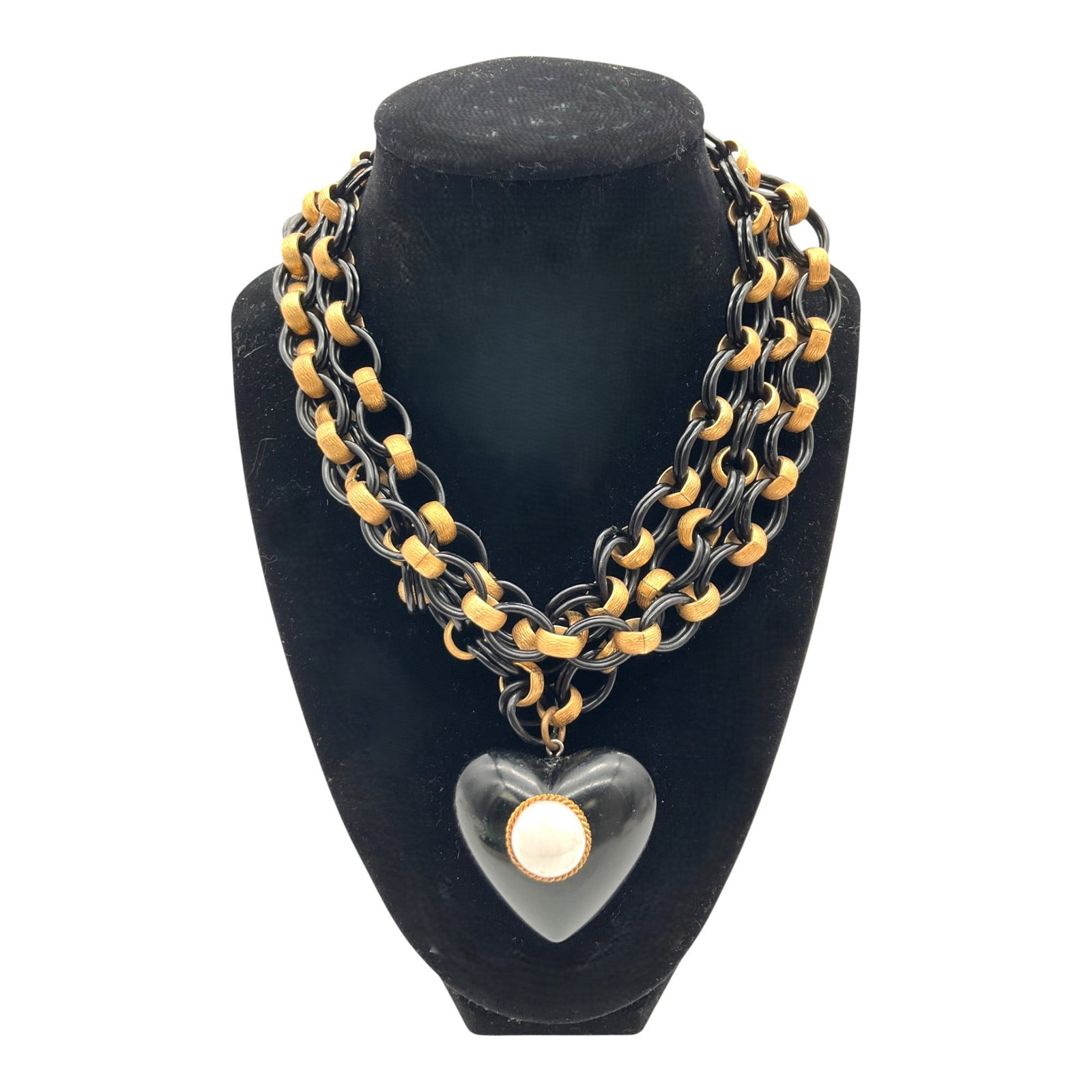 Vintage Chunky Runway Triple Strand Necklace With Heart Pendant: Vintage Chunky Triple Strand Necklace with Gold and Black Links, Large Heart Pendant with Faux Pearl Center. Approx. 17.5 inches tall x 1.5 wide (2 inches tall x 2 wide x 0.75 deep.
