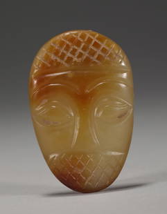 Red mountain jade face shaped ware: H:in(5.3cm) L:in(cm) W:in(3.5cm) wt:26g