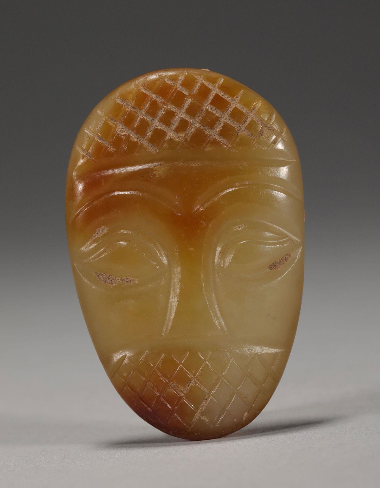 Red mountain jade face shaped ware (1 of 6)