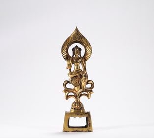 Bronze gilt bench Buddha in the 6th century