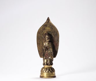 Bronze gilt bench Buddha in the 6th century