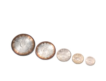 A Group of Silver C oi ns , Qing Dynasty, China