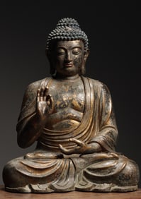Sitting statue of Shakyamuni in the Qing Dynasty Copper gilding