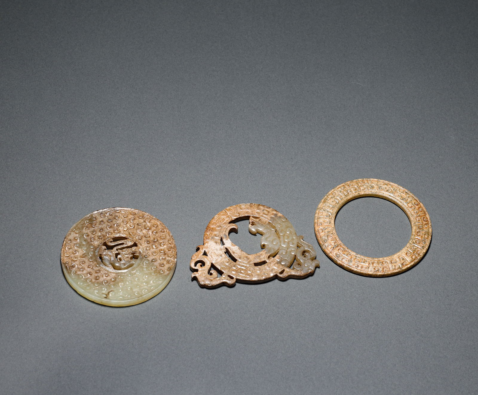 Three pieces of Hetian jade in the Han Dynasty: D:6.5cm,Weight:80g