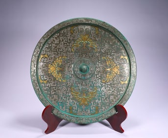 Bronze mirror with inlaid gold and silver inlaid with turquoise and four phoenix patterns from the