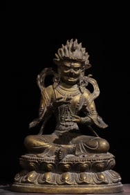 A Qing Dynasty Tibetan Buddhist statue of the Yellow Wealth God