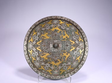 Bronze mirror with inlaid gold and silver patterns of auspicious animals and birds from the Han