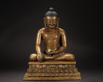 A 15th-century bronze statue of Sakyamuni Buddha