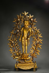 A 15th-century gilded bronze standing statue of Maitreya Bodhisattva
