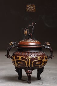 A high-relief incense burner from the Xuande period of the Ming Dynasty